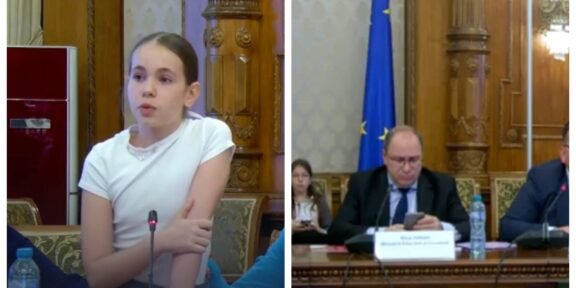 Woman speaking into a microphone at a formal meeting, ornate wood paneling behind her (left).