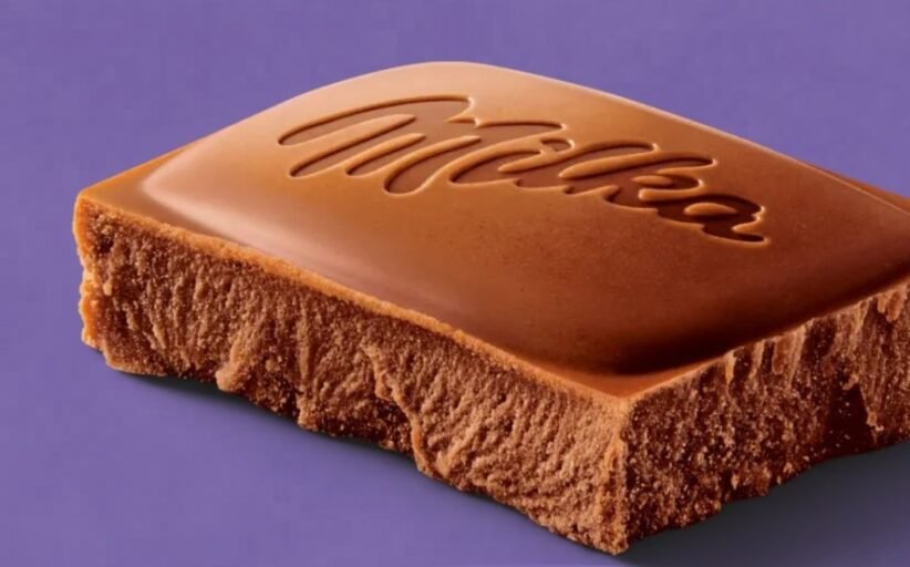 Milk chocolate bar with the Milka logo embossed on a purple background.